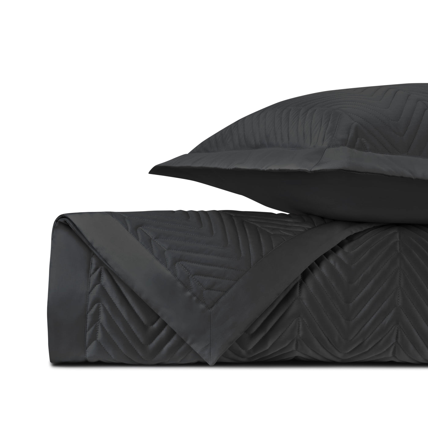 Chevron quilted texture detail on Charleston coverlet in black.