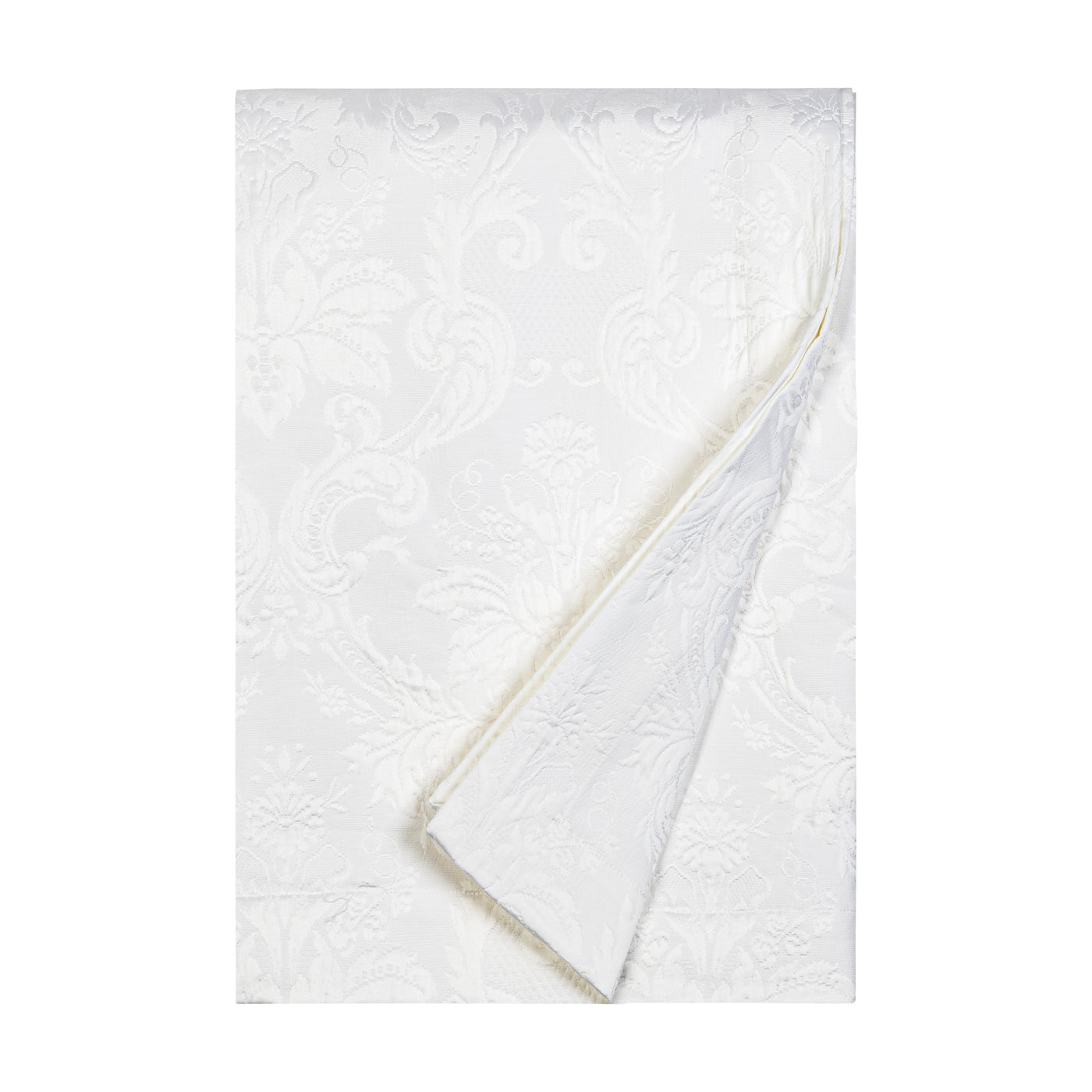 Corner fold revealing ivory jacquard damask weave and reverse side texture.