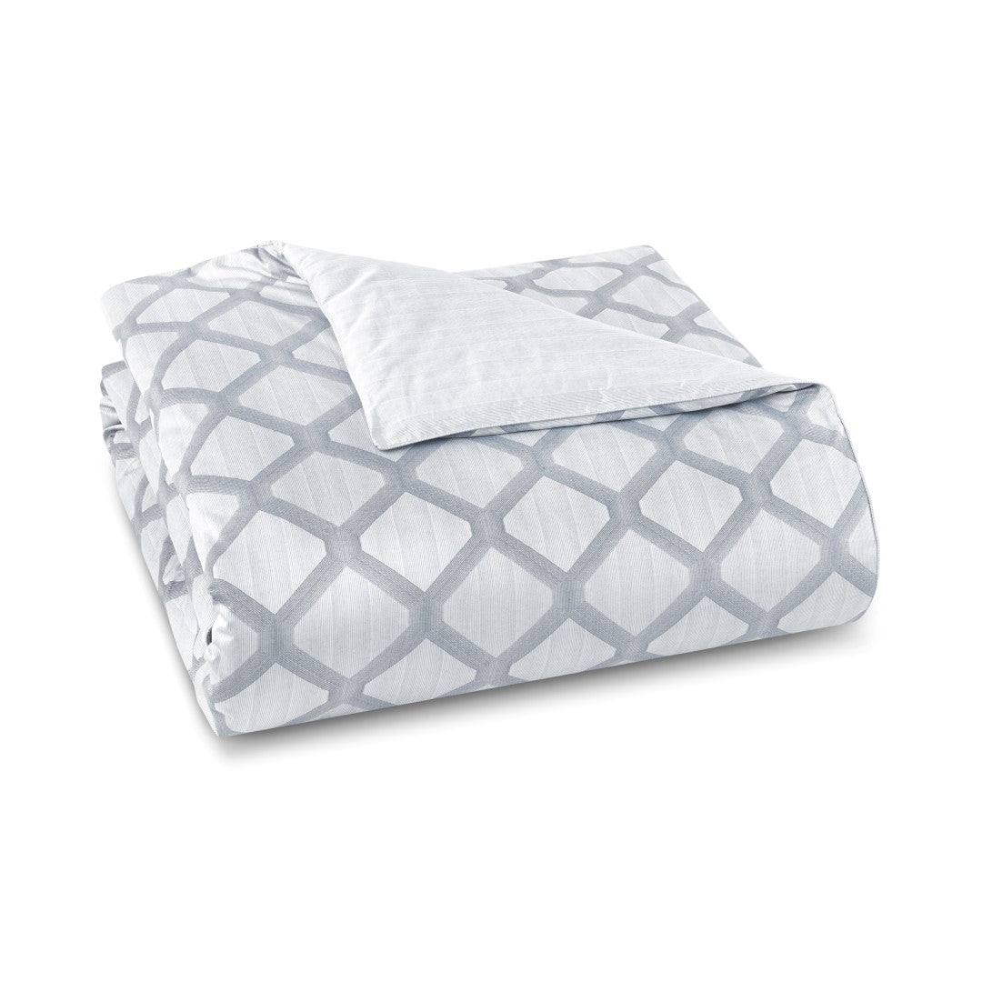 Amalia Home Collection Cidade duvet cover in white with silver geometric lattice pattern.
