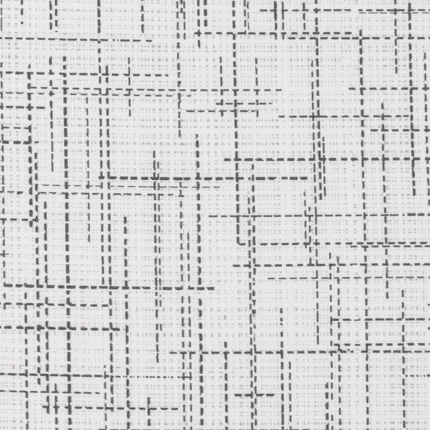 Close-up of ivory fabric with irregular charcoal crosshatch stitch pattern.