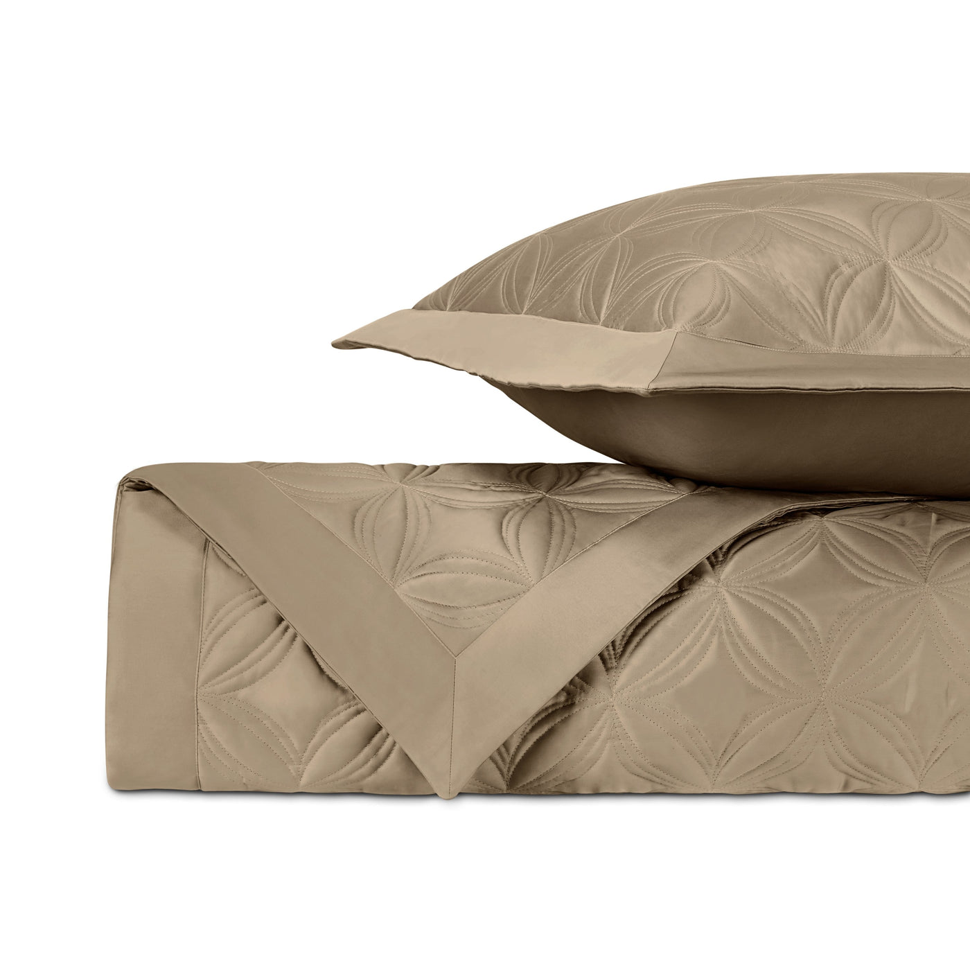 Close-up of Home Treasures Dara quilted coverlet in khaki with floral medallion pattern.