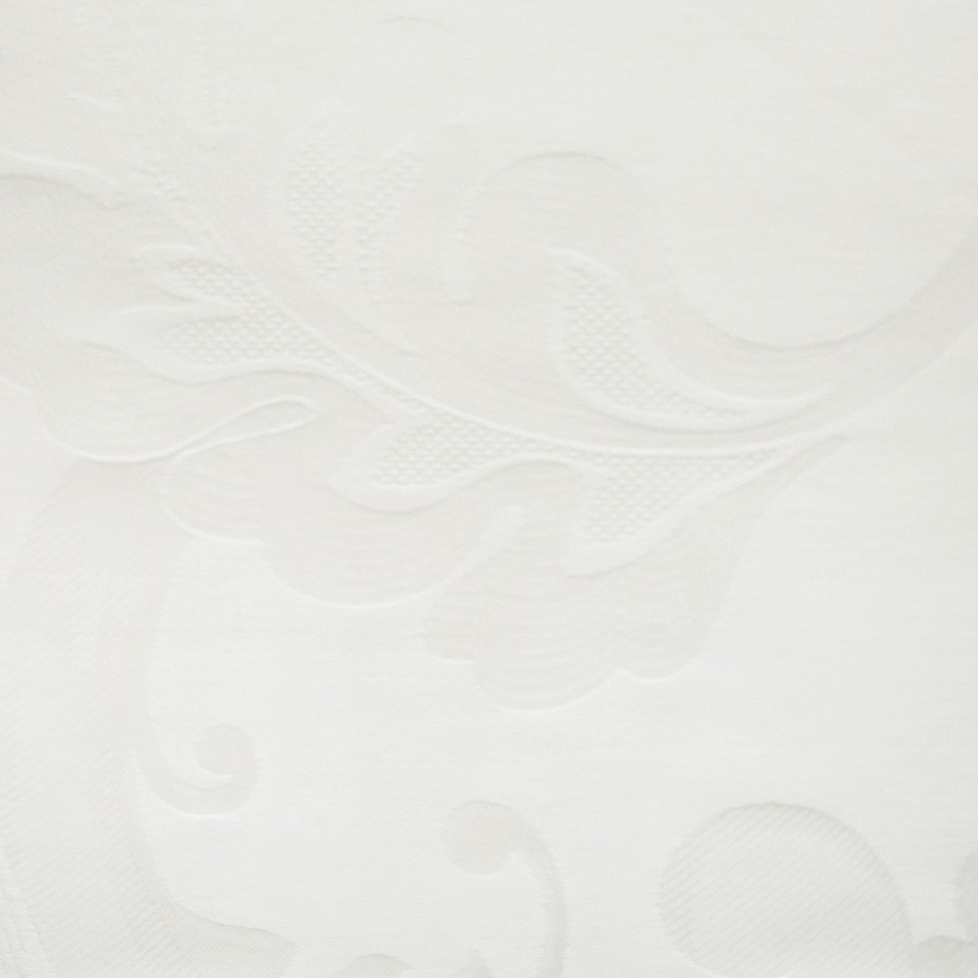 Close-up of ivory Darian jacquard weave showing scrolling floral damask texture.
