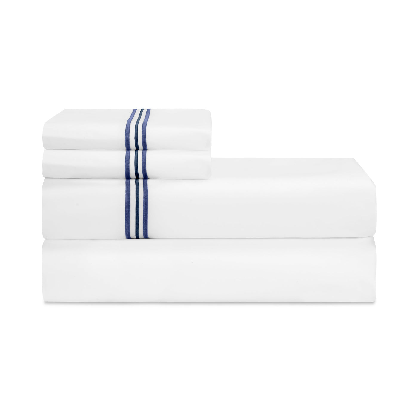 Close-up of white pillowcase stack with navy triple-stripe embroidery detail.