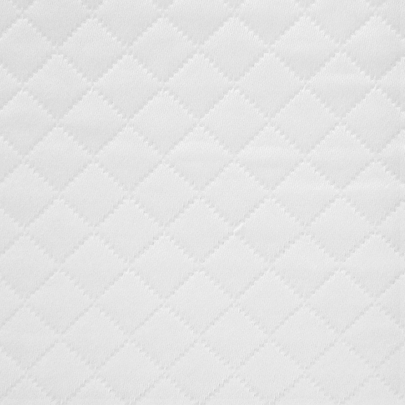 Close-up of white quilted diamond-stitched fabric texture.