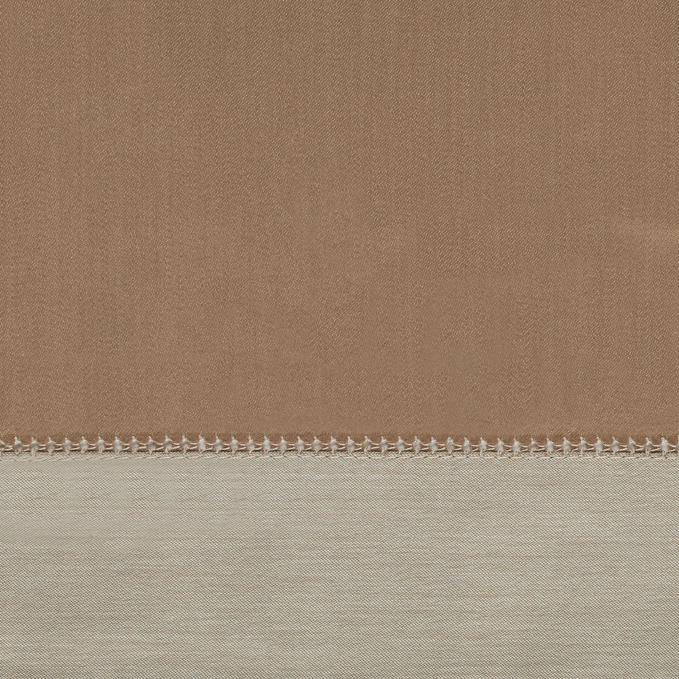 Close-up of camel and ivory linen yardage with contrast hemstitch border detail.