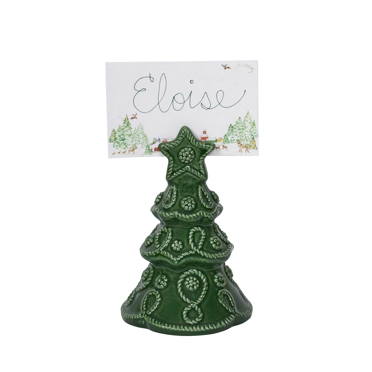 North Pole place card with a handwritten name, held in a green tree place card holder