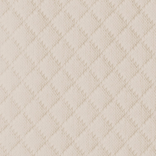 Close-up of ivory cotton coverlet with tonal diamond quilted stitching pattern.