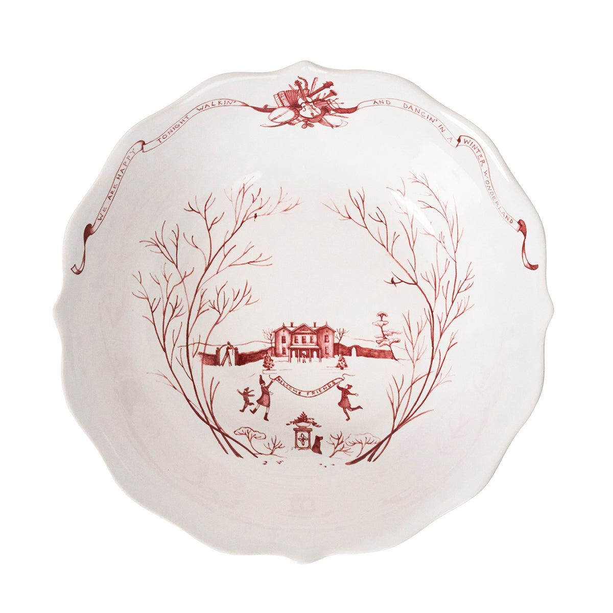 Inside of the ruby Winter Frolic serving bowl with the main house and a bow on the rim