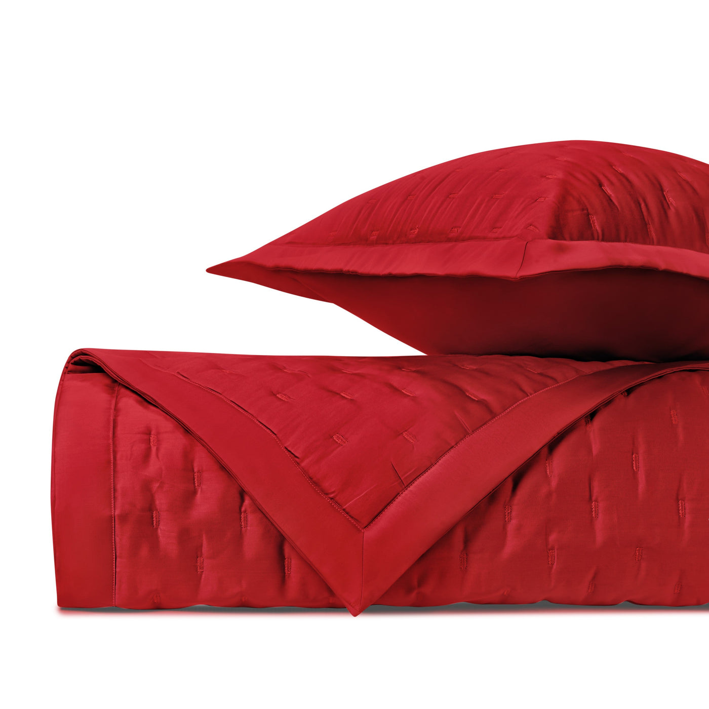 Close-up of Home Treasures Fil Coupé quilted texture in crimson red.