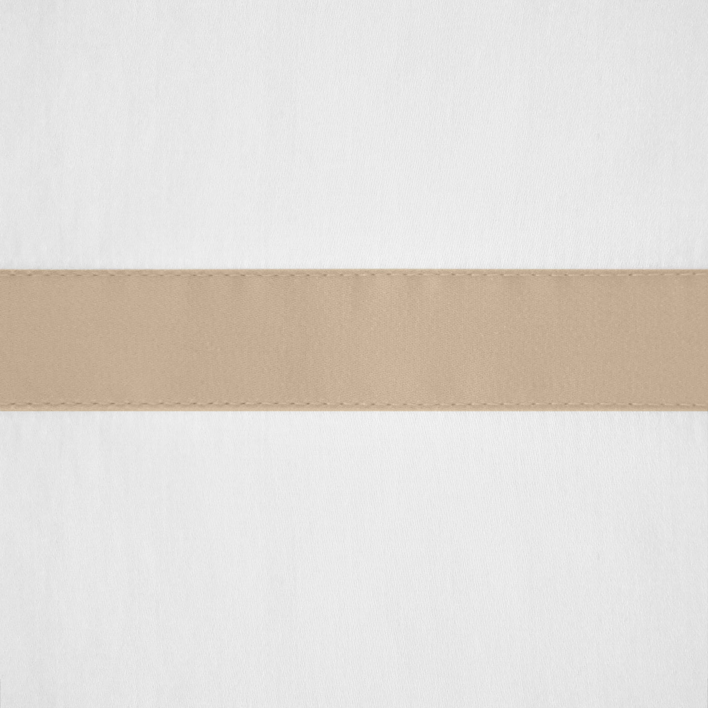 Close-up of champagne satin border stripe with topstitching detail on white linen.