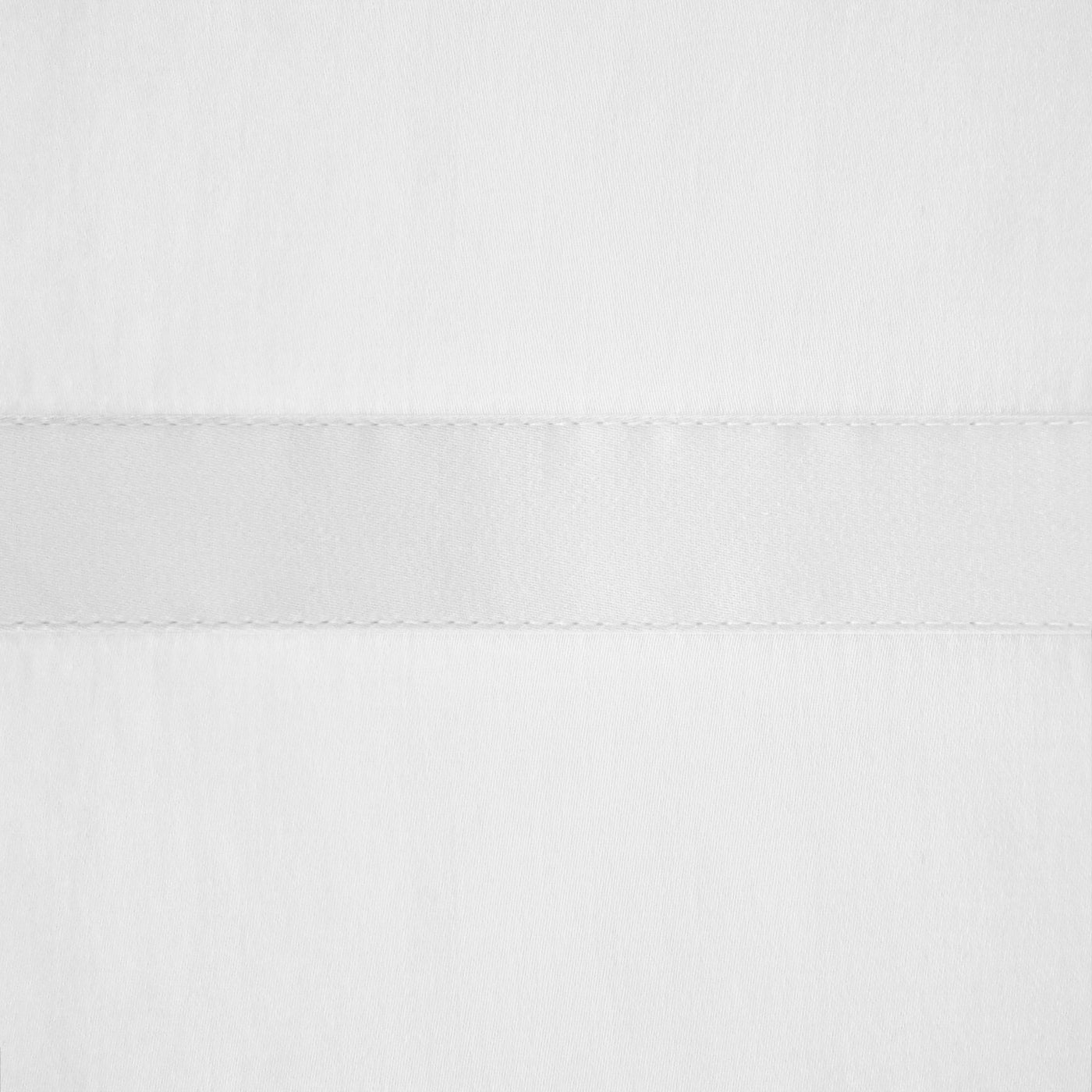 Close-up of white Fino linen fabric with a satin ribbon border detail.