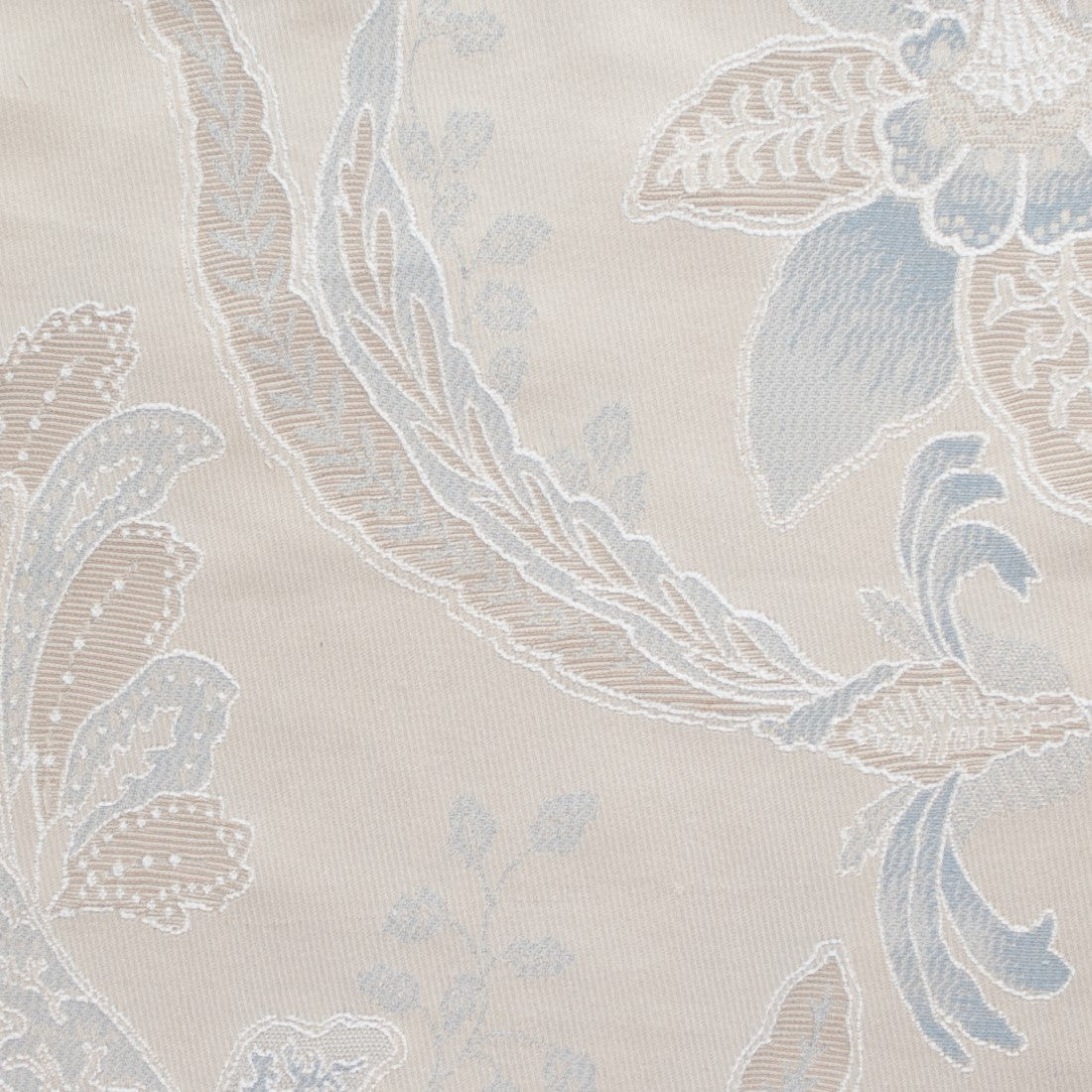 Close-up of Home Treasures Fiori duvet cover jacquard weave in ivory with powder blue floral motif.