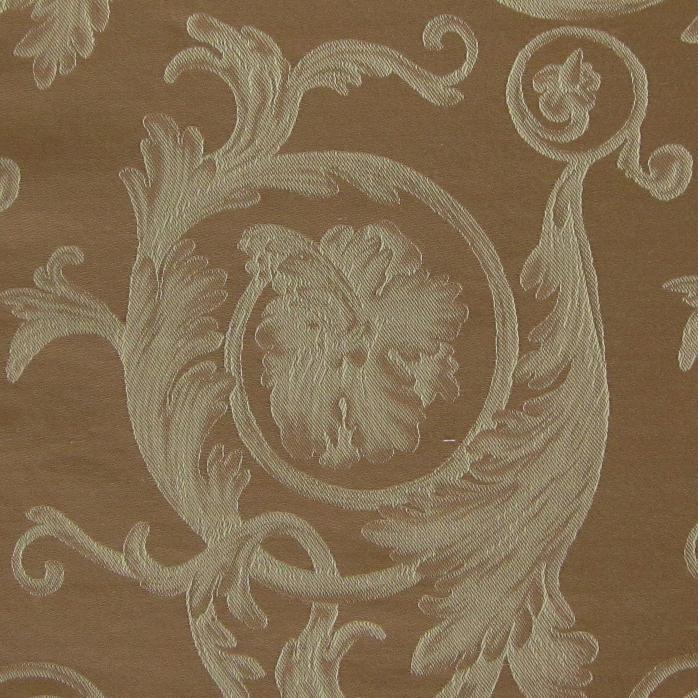 Close-up of Home Treasures Firenze sham in gold jacquard with ornate acanthus and medallion weave.