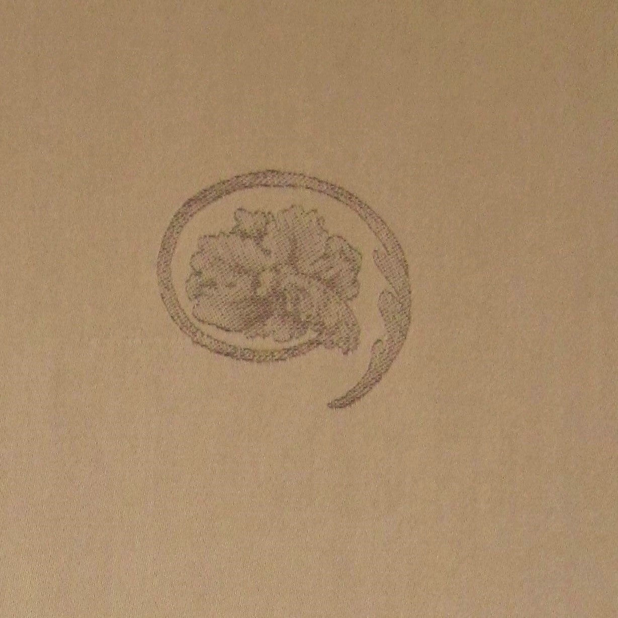 Warm sand linen flat sheet with tonal Firenze emblem detail by Home Treasures.