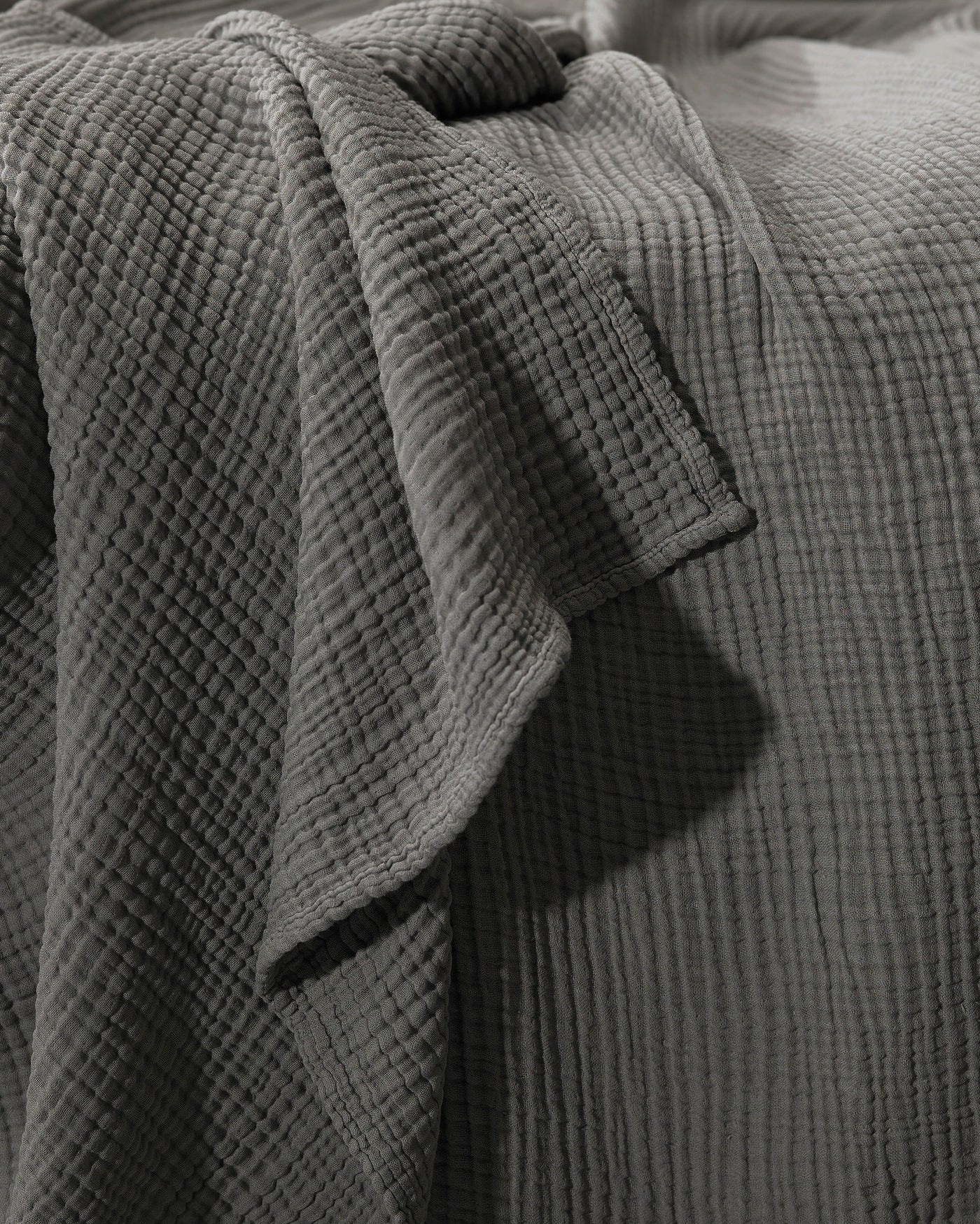 Close-up of Society Limonta Free New bedcover in slate, showing textured cotton gauze layers.
