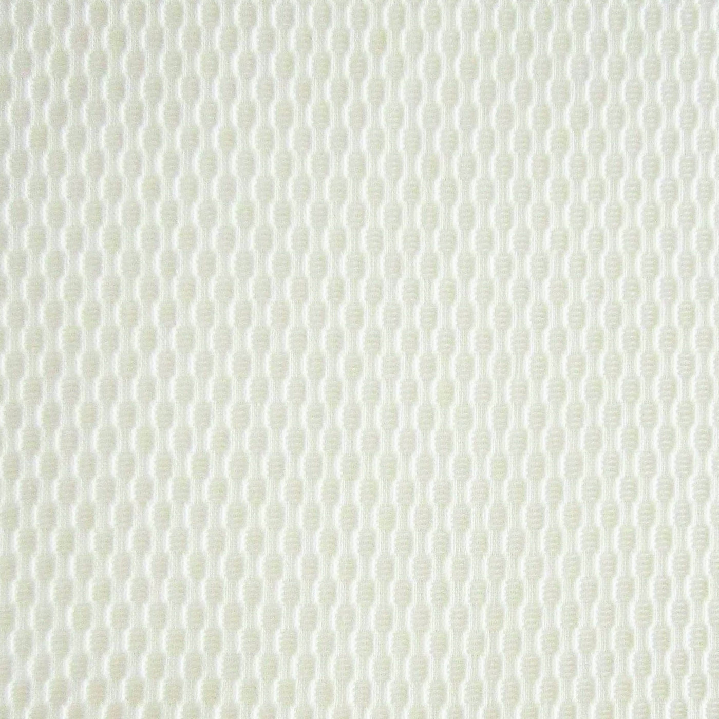 Close-up of Home Treasures Honeycomb ivory woven oval-repeat texture.