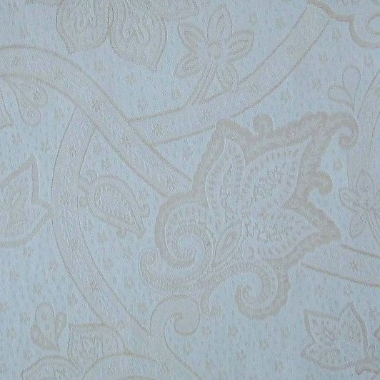 Close-up of Kashan jacquard weave in ivory, showing intricate floral and vine motif detail.