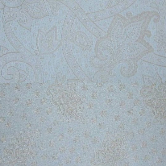 Close-up of Kashan duvet cover showing powder blue jacquard paisley weave detail.