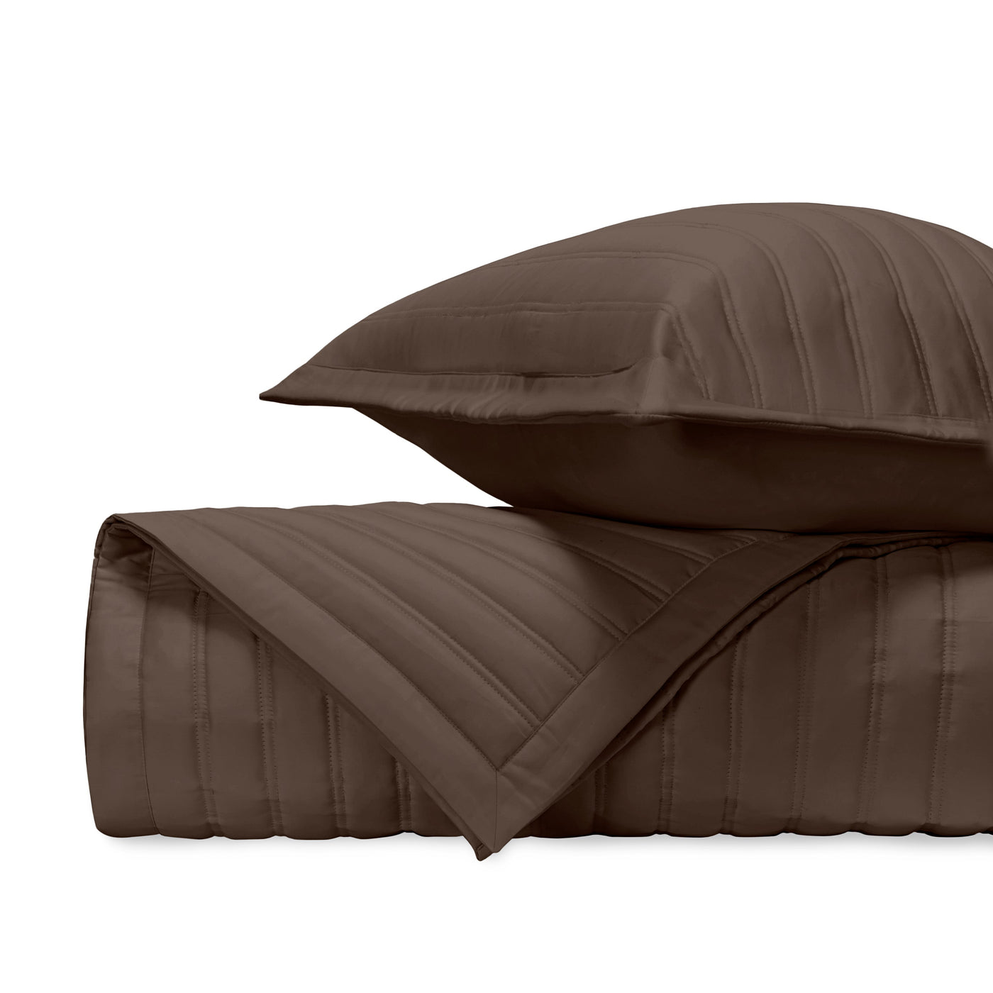 Close-up of L'Avenue quilted satin in chocolate with parallel channel stitching.
