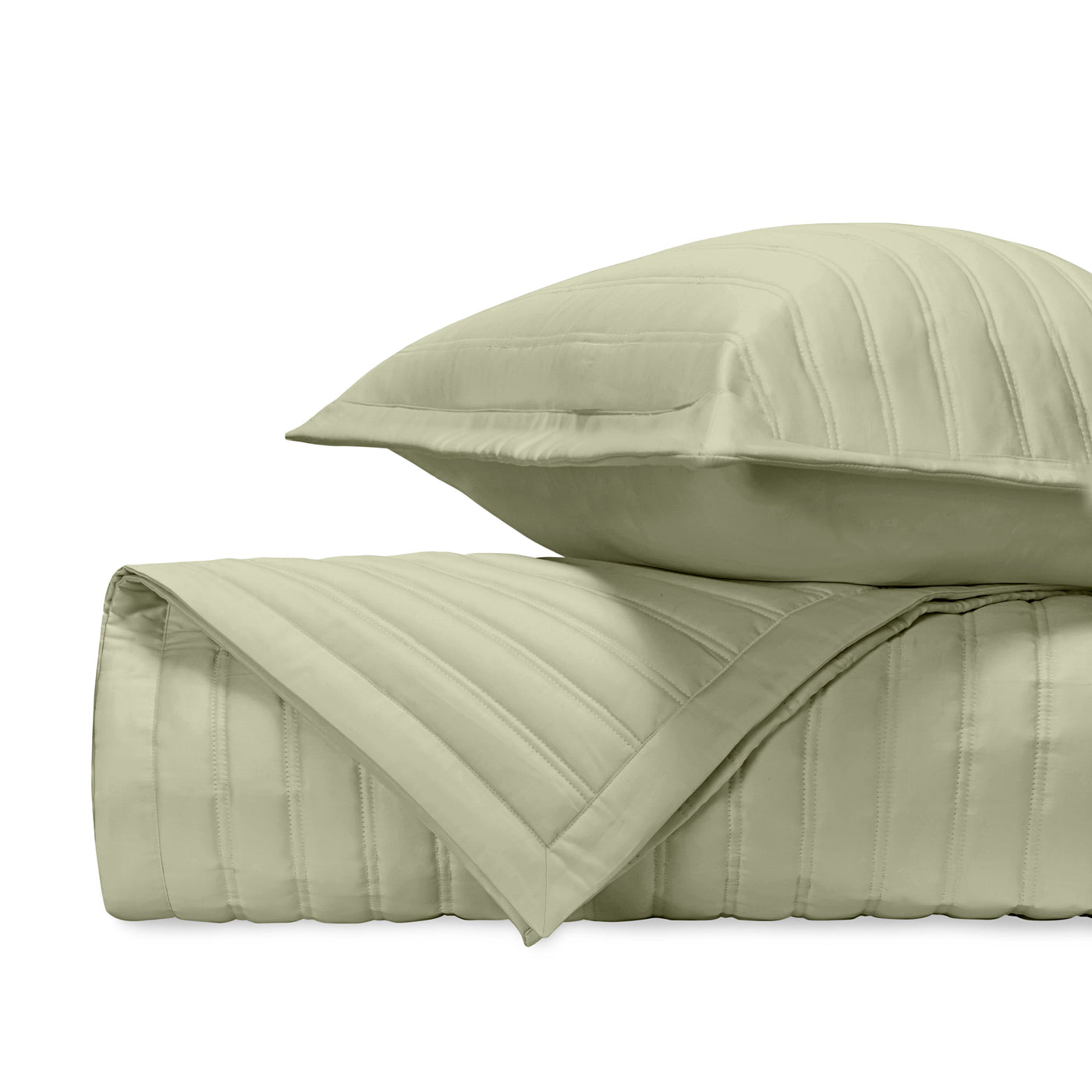 Sage green quilted satin bedding with tonal channel stitching, folded with matching sham.
