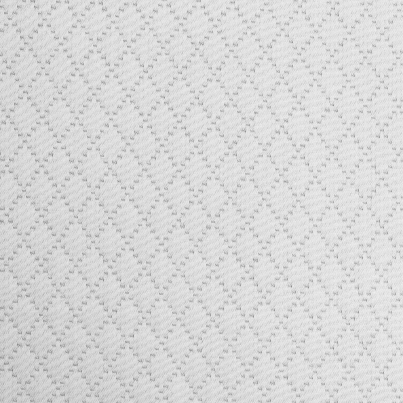 Close-up of white-on-white woven diamond lattice pattern on cotton fabric.