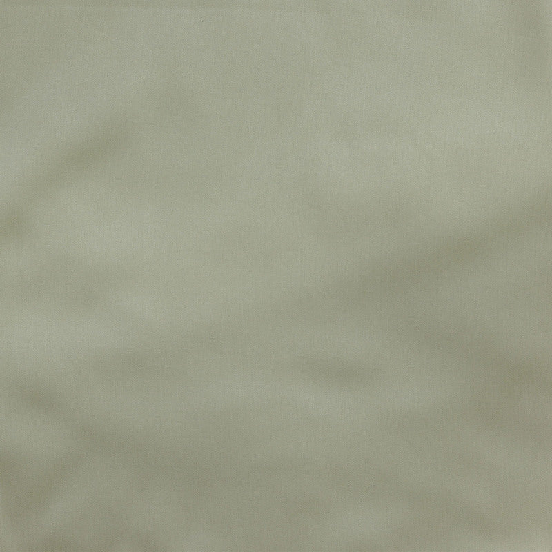 Sage green fabric close-up showing smooth woven texture with subtle surface variation.