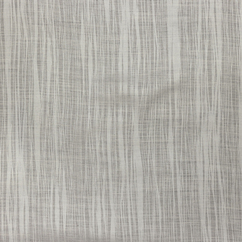 Close-up of Tigris bedskirt fabric in silver-grey with vertical streak weave texture.