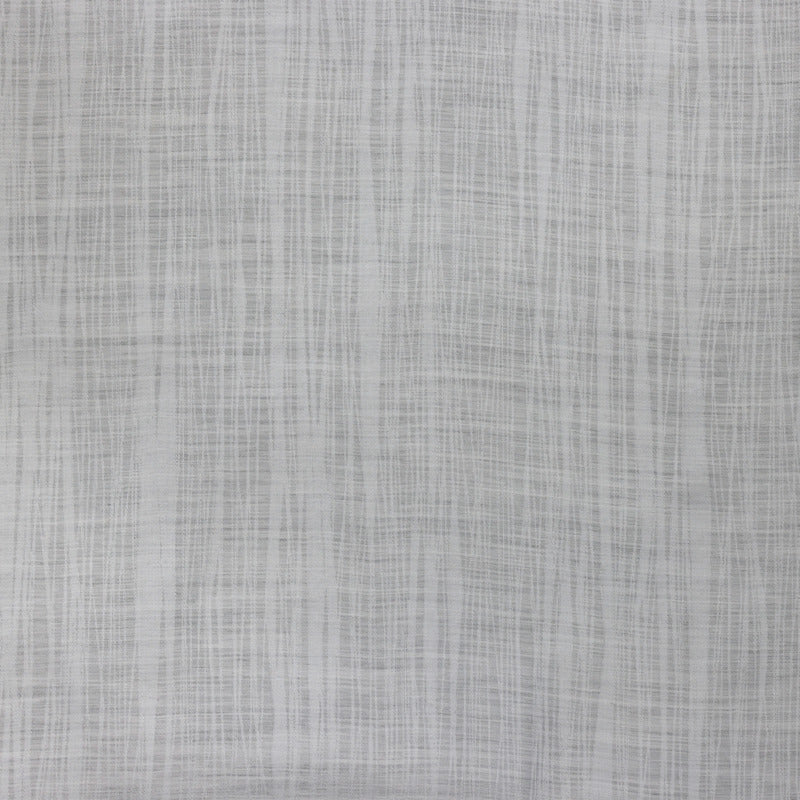 Close-up of Legna Tigris pillow fabric in silver-grey linen weave texture.