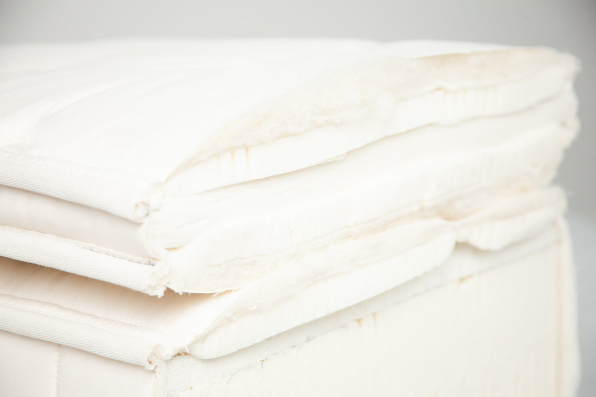 Cutaway of the LETTO topper showing its natural latex and cotton layers