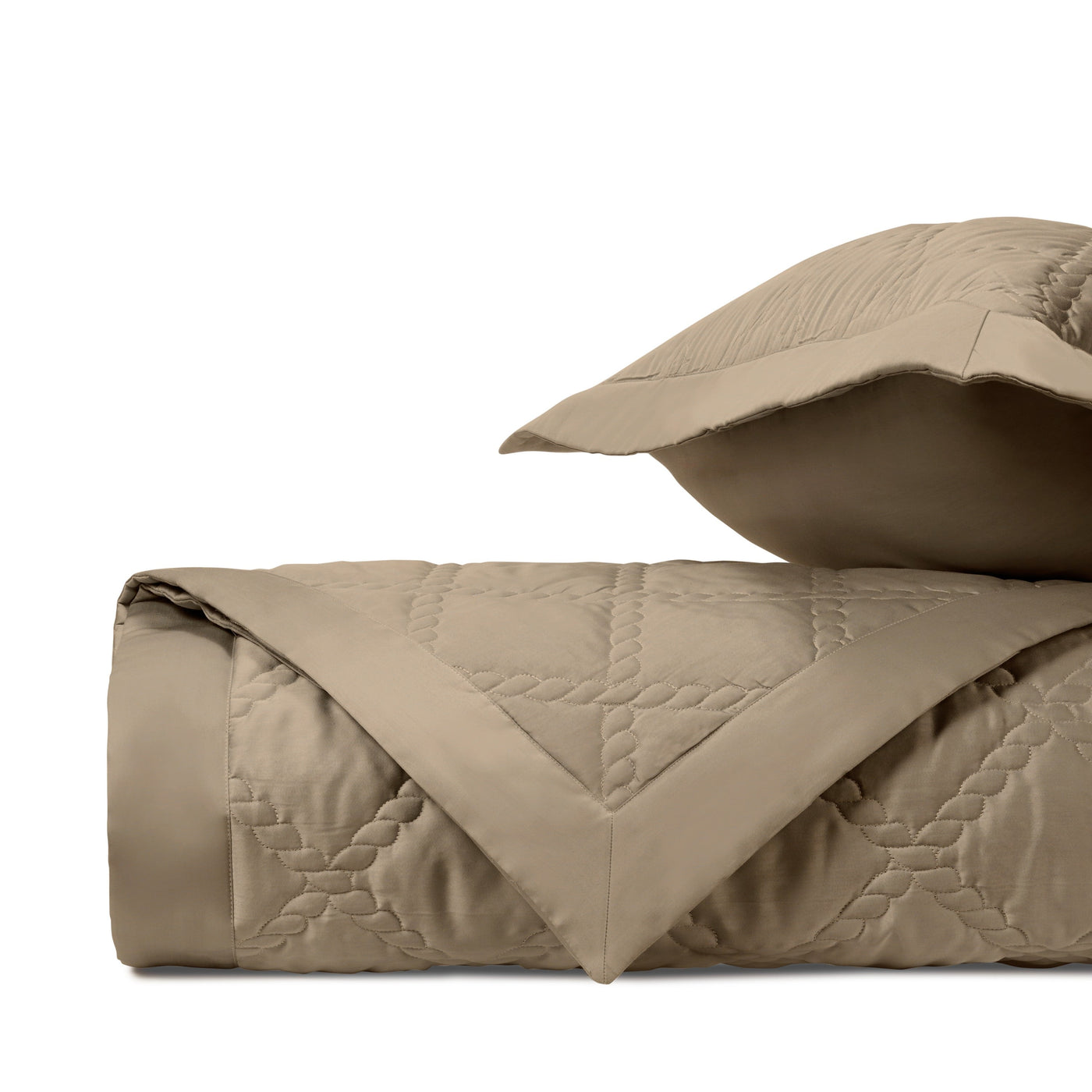 Close-up of Home Treasures Liberty quilted texture in khaki with geometric stitching.