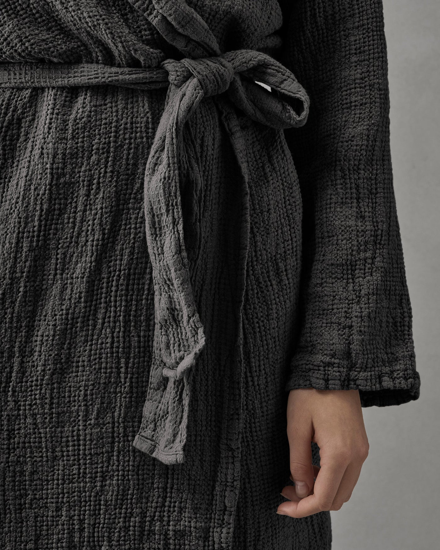 Close-up of Society Limonta Lipe New robe belt tie in charcoal waffle-weave cotton.
