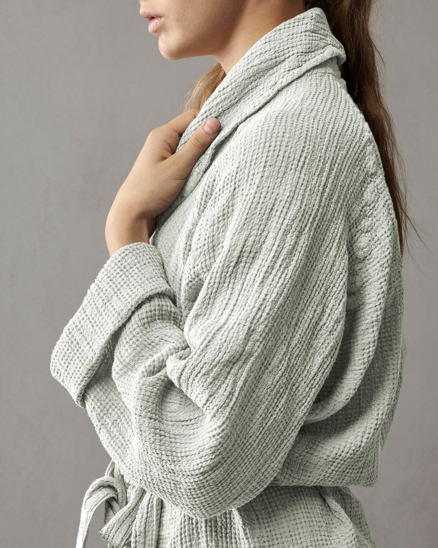 Close-up of Society Limonta Lipe New robe in sage, showing waffle-texture detail and shawl collar.