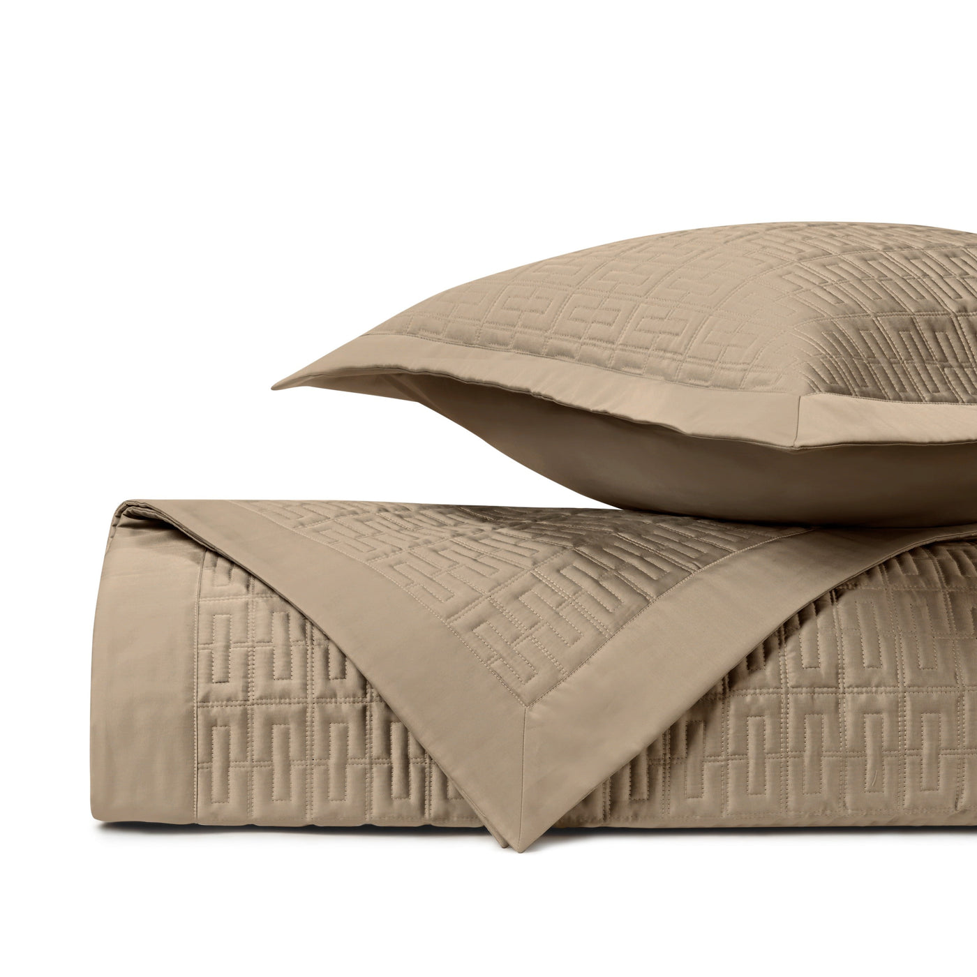 Close-up of Londres quilted coverlet and sham in khaki with geometric maze stitching.