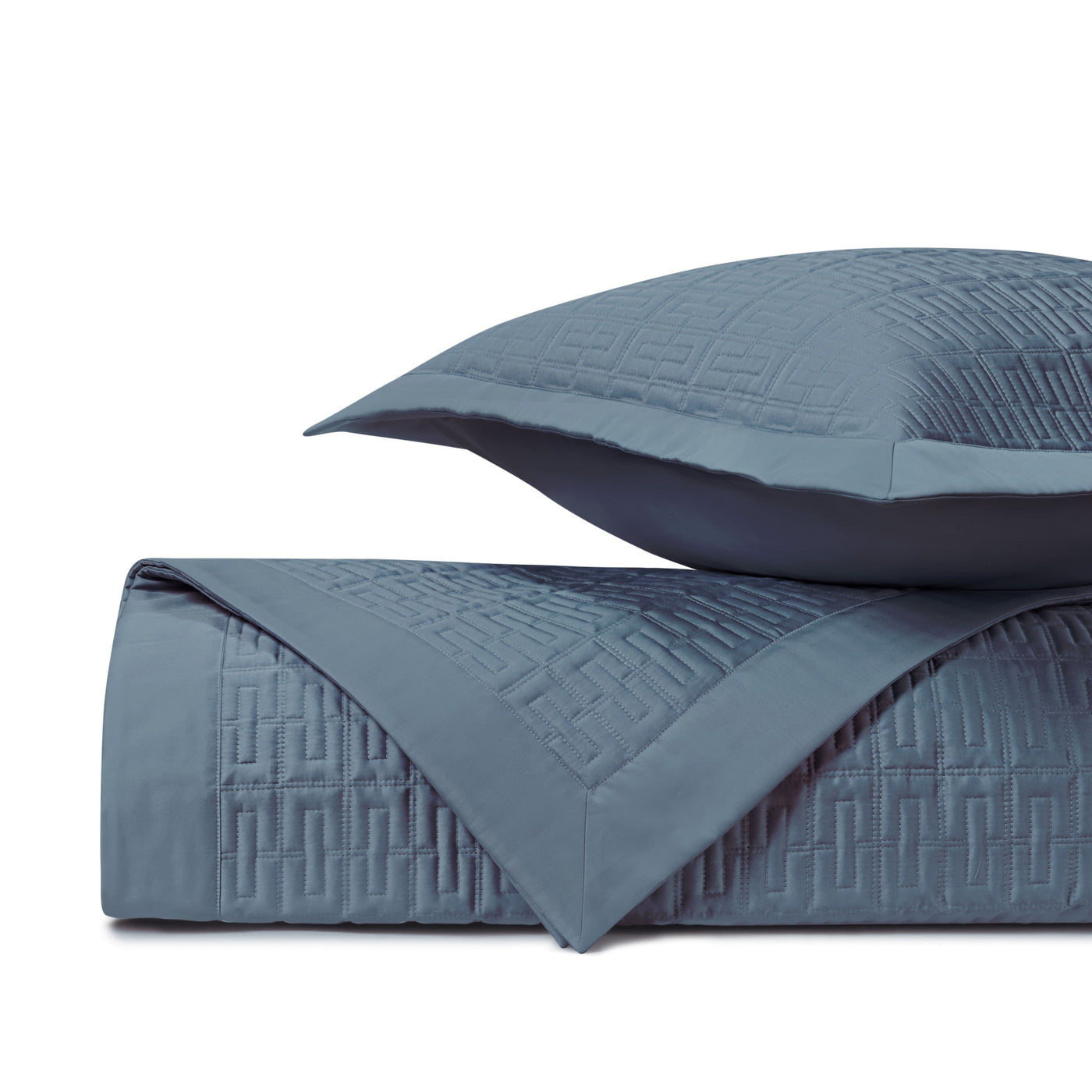 Home Treasures Londres slate blue quilted coverlet and sham with geometric Greek key pattern.
