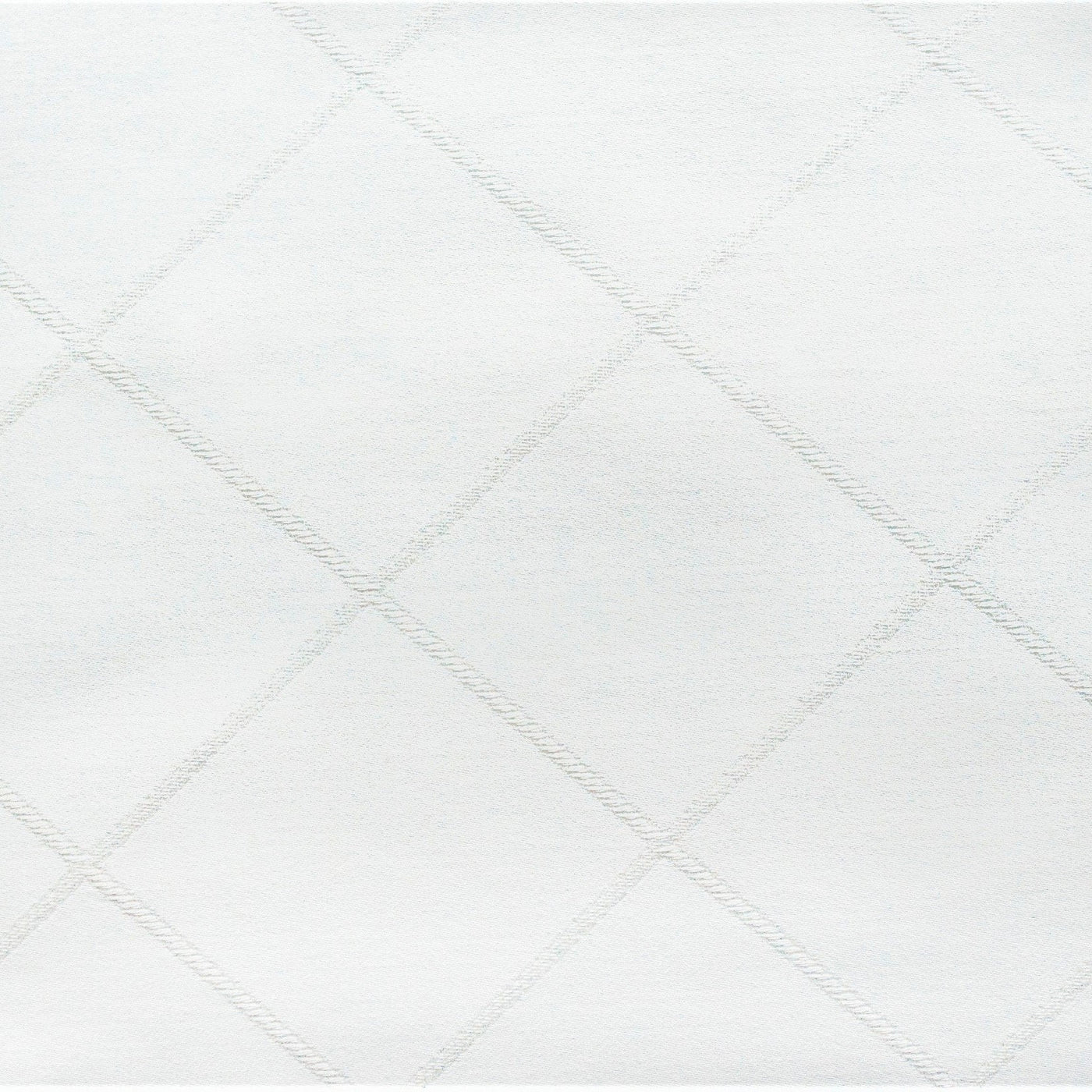 Close-up of white diamond jacquard weave on Home Treasures Luciana pillow sham.