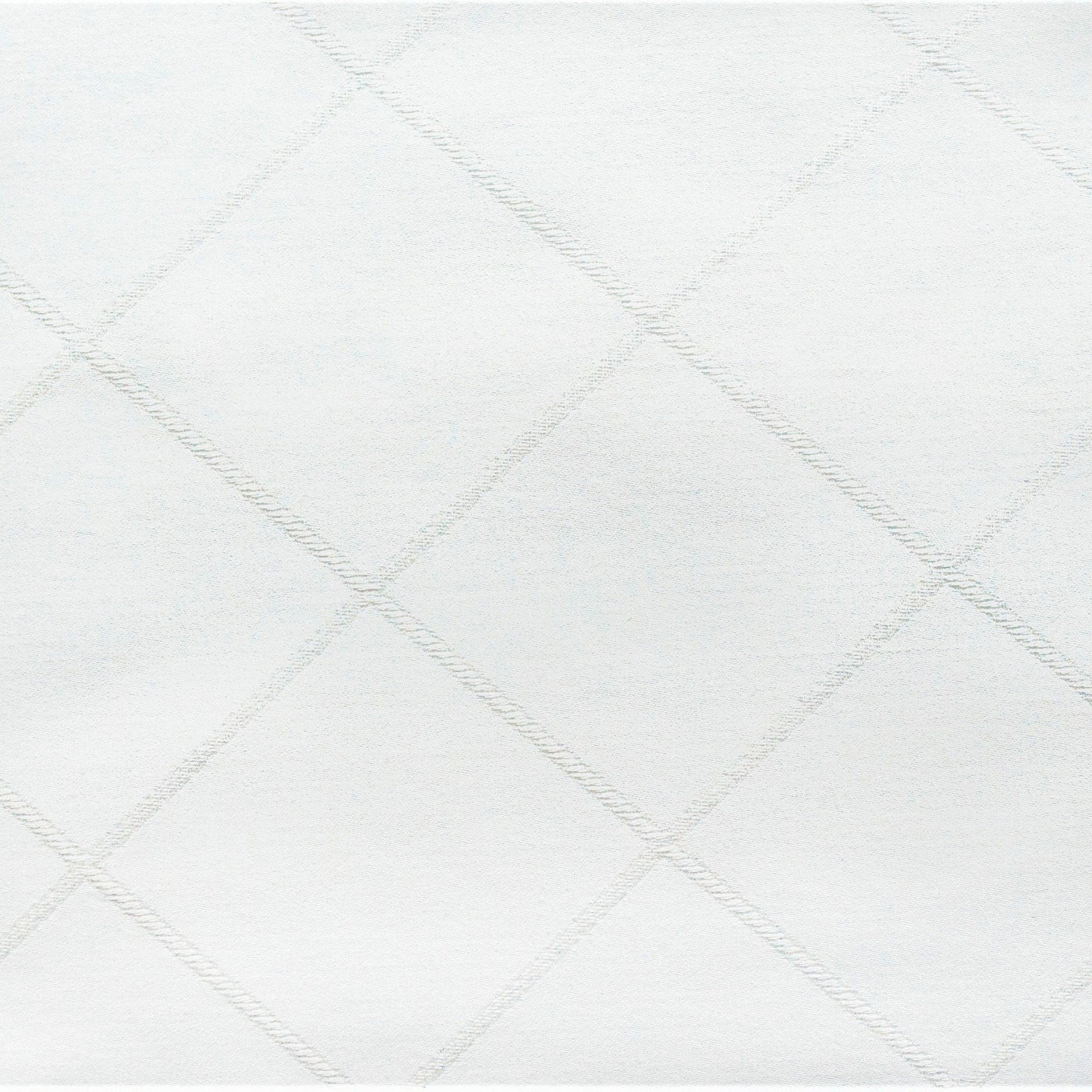 Close-up of Home Treasures Luciana white woven diamond lattice pattern.