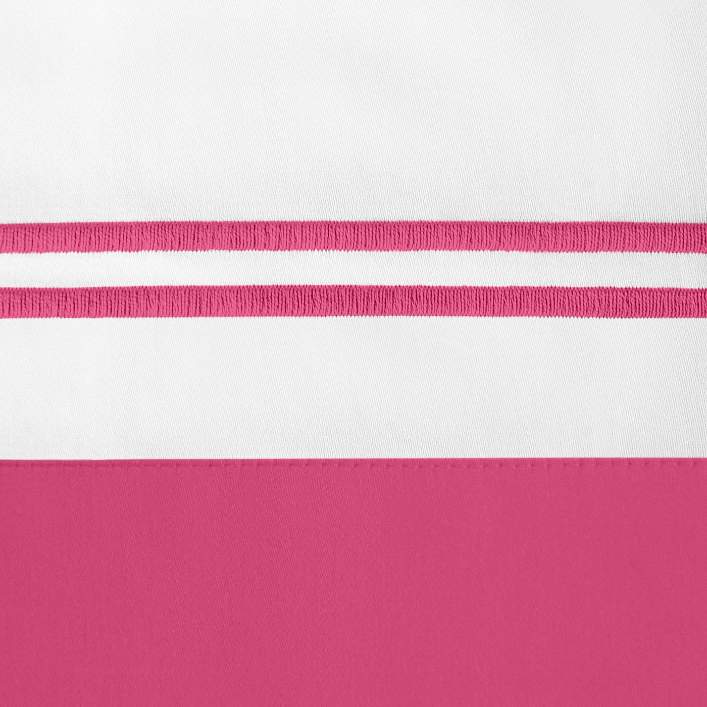 Close-up of white linen with twin raspberry embroidered stripes above a raspberry border.