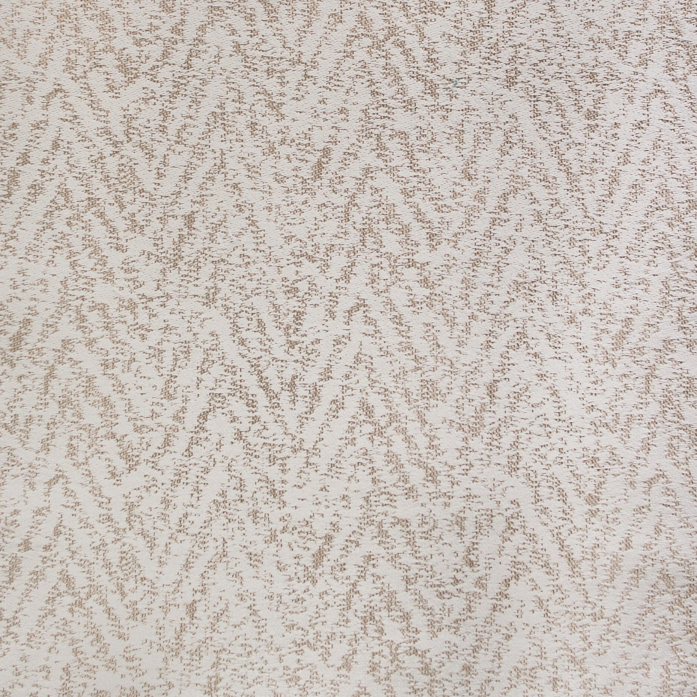 Close-up of Home Treasures Mayfair fabric showing ivory and champagne chevron texture.