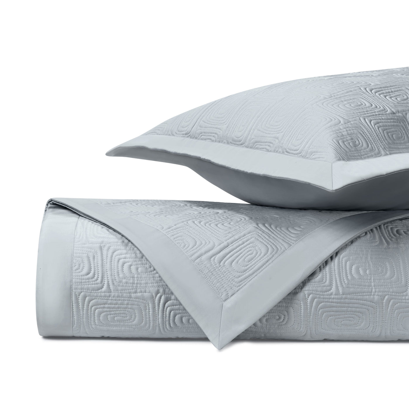 Close-up of Home Treasures Maze quilted texture in silver with geometric relief pattern.