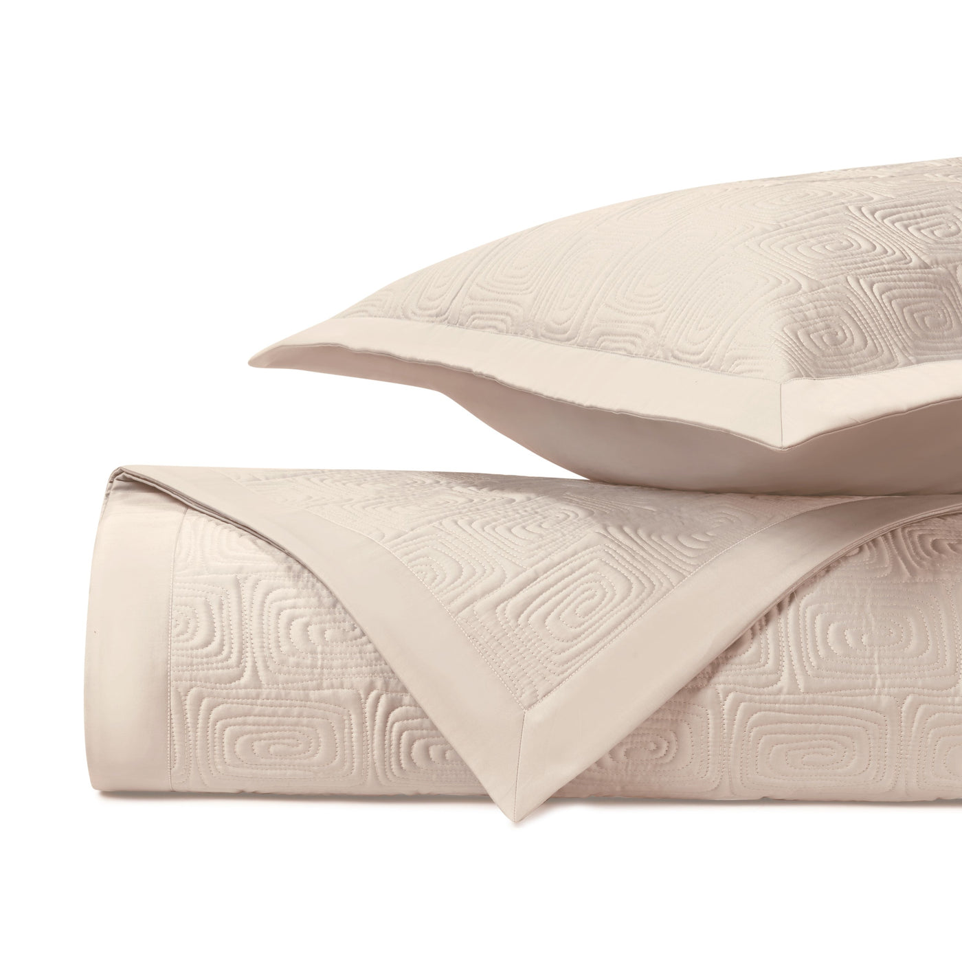 Close-up of Home Treasures Maze quilted texture in blush with geometric square pattern.