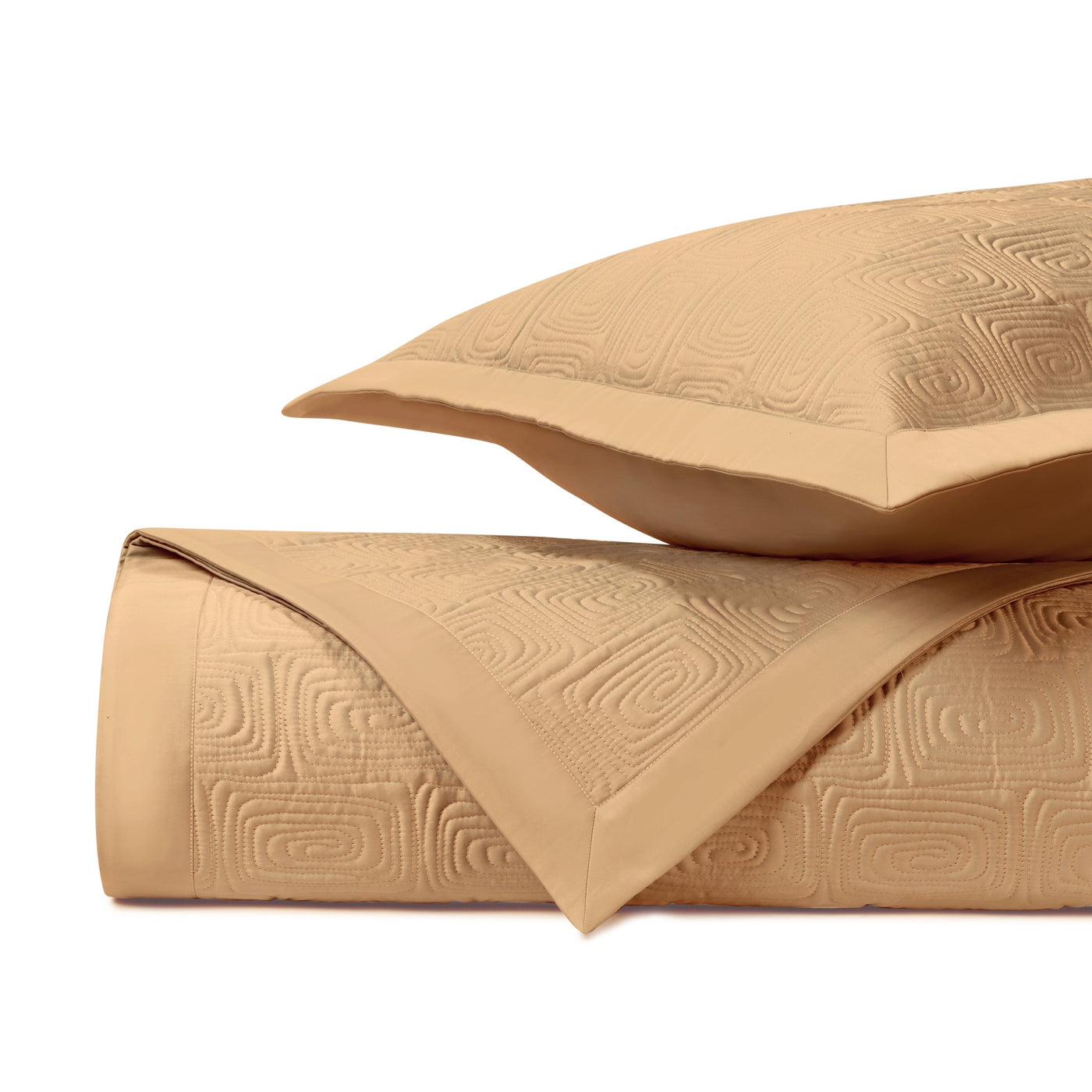 Close-up of Home Treasures Maze quilted texture in champagne with geometric square motif.