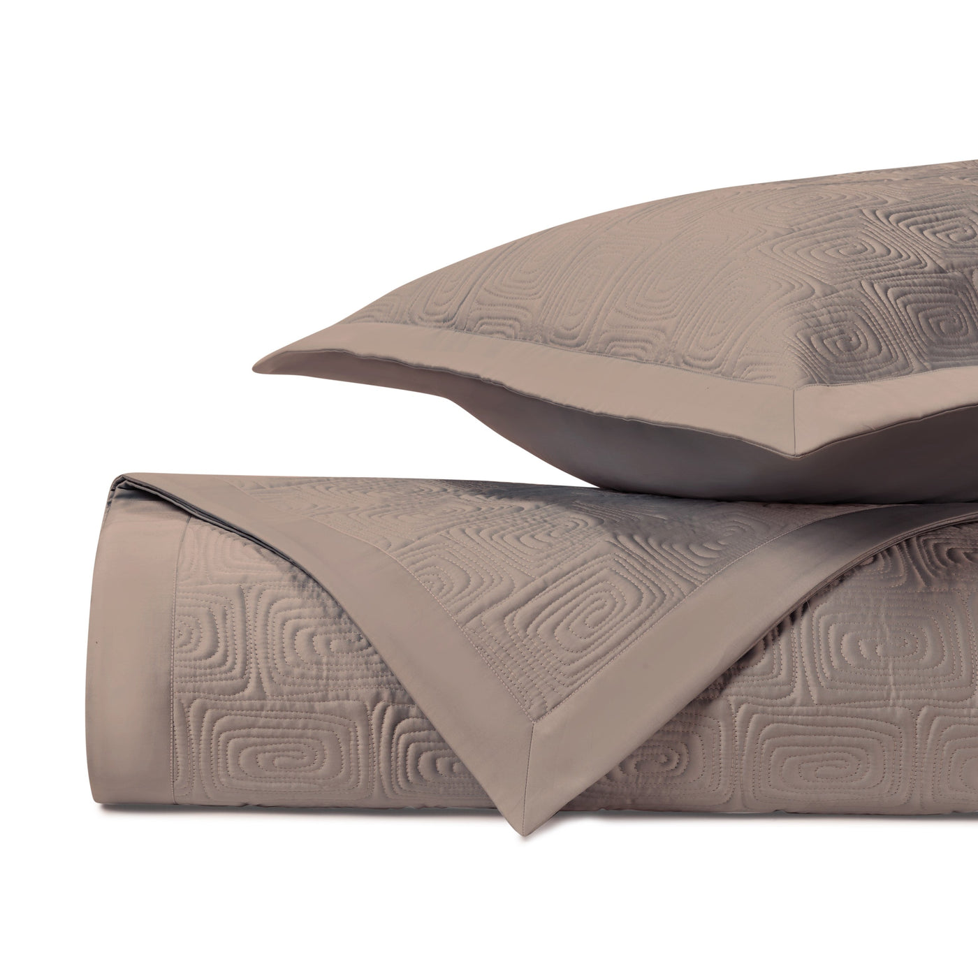 Close-up of Home Treasures Maze quilted texture in taupe with geometric square pattern.