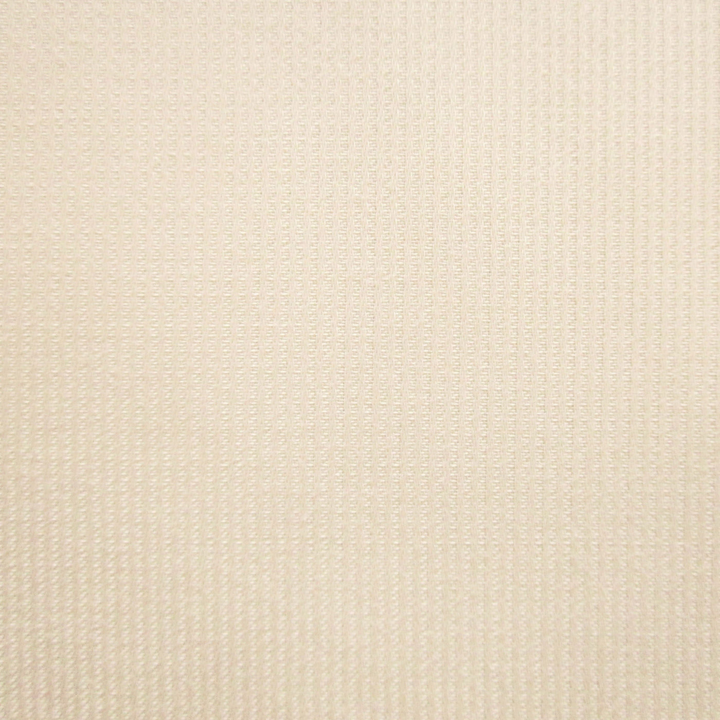 Close-up of ivory woven cotton fabric showing subtle textural stripe pattern.
