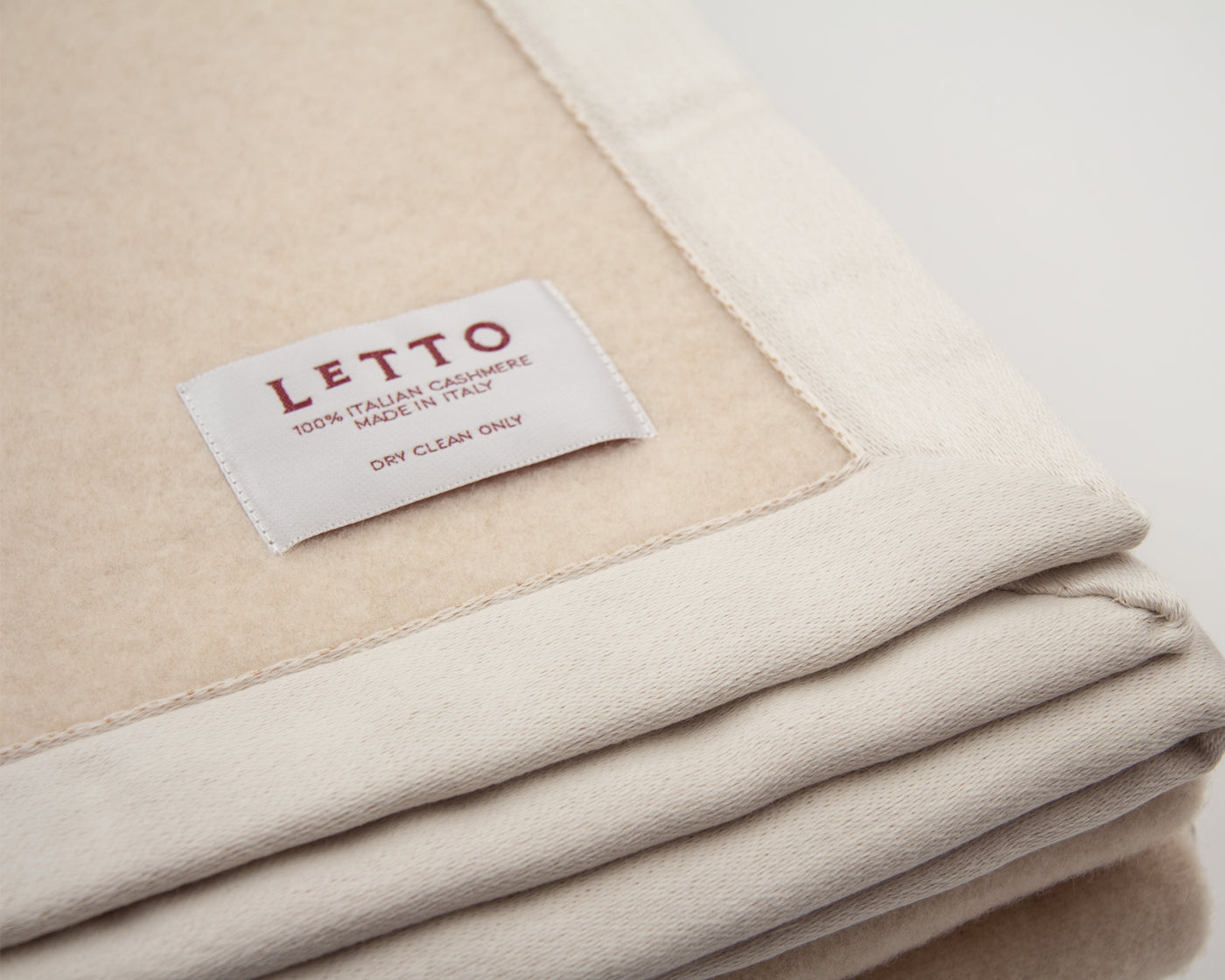 a white blanket with a white label