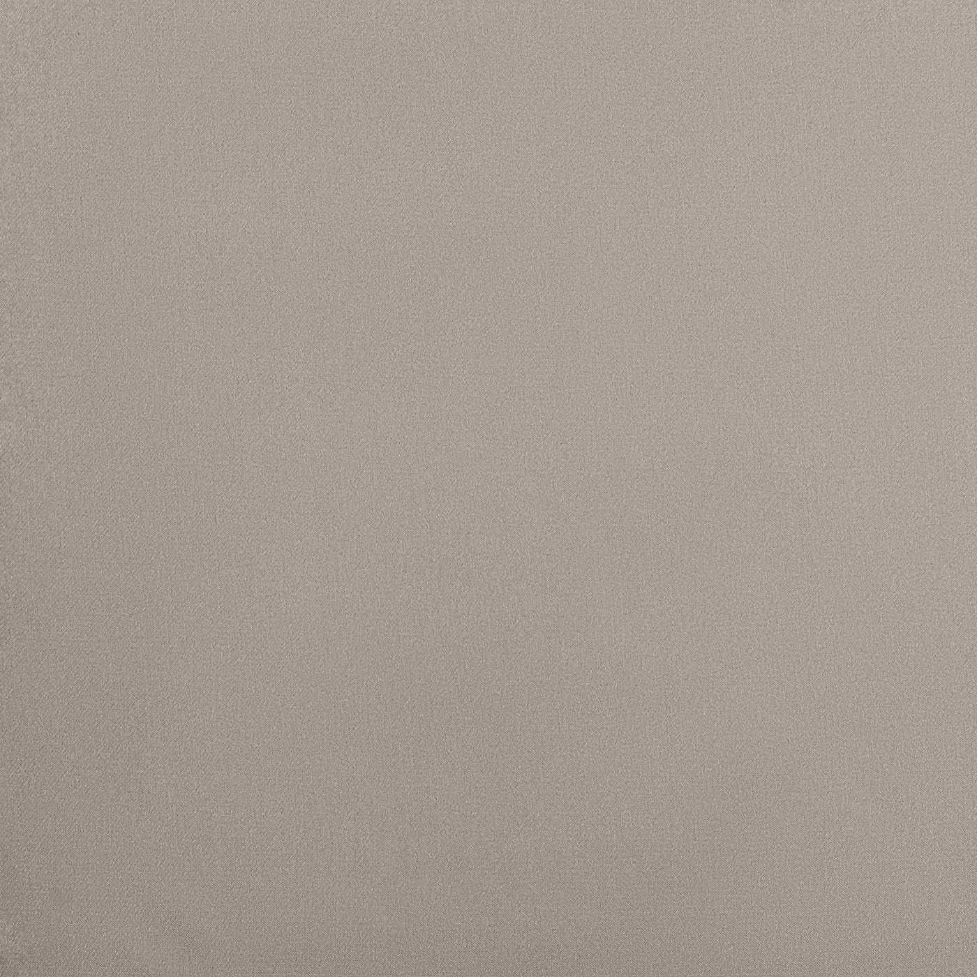 Pebble fitted sheet in a smooth, uniform fabric close-up.