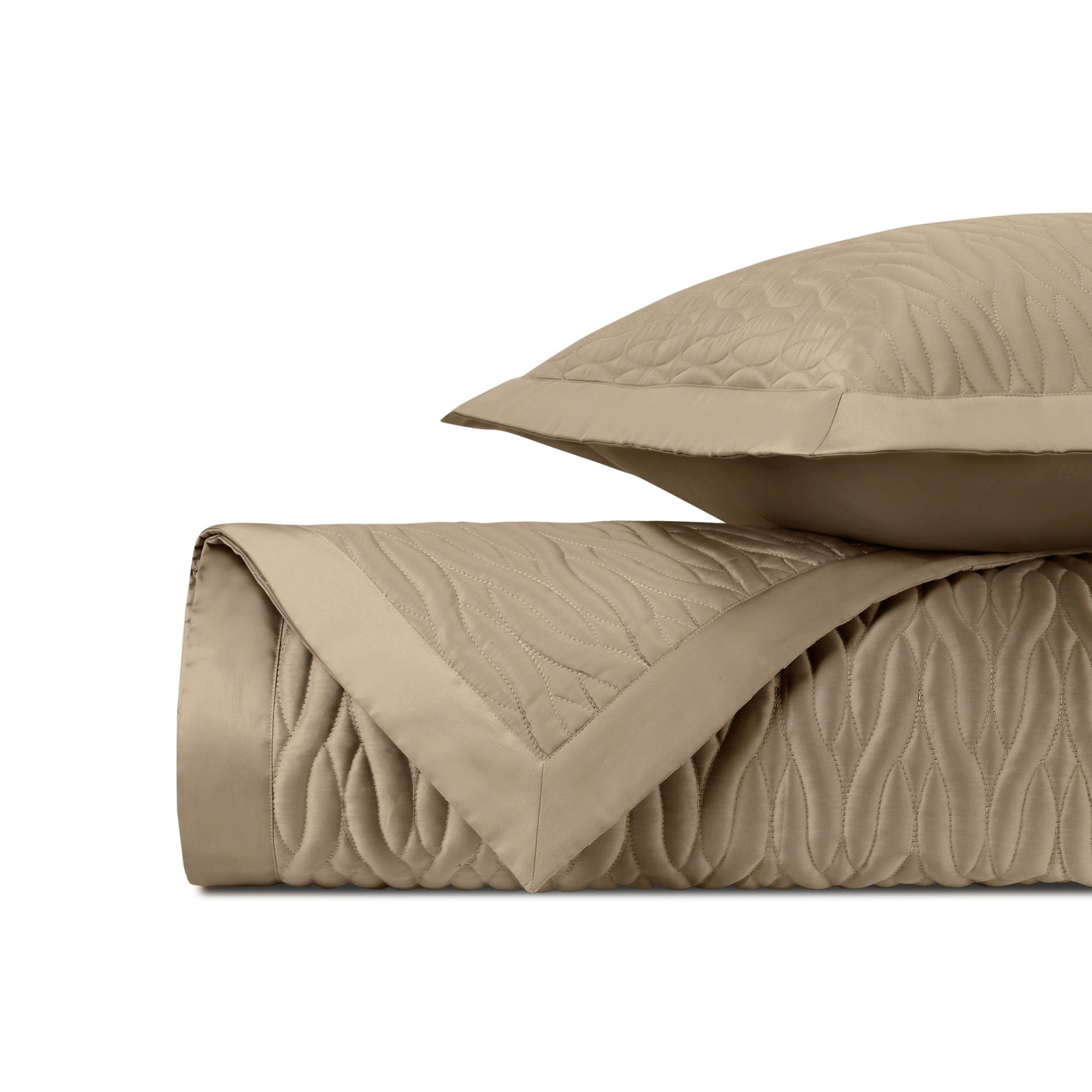 Close-up of Home Treasures Napa quilted texture in warm khaki with satin border detail.