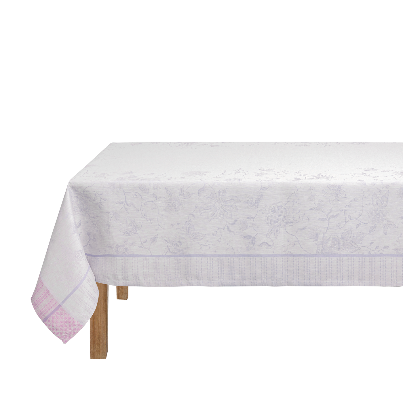 Corner detail of Été Indien tablecloth showing rose and lavender woven border trim.