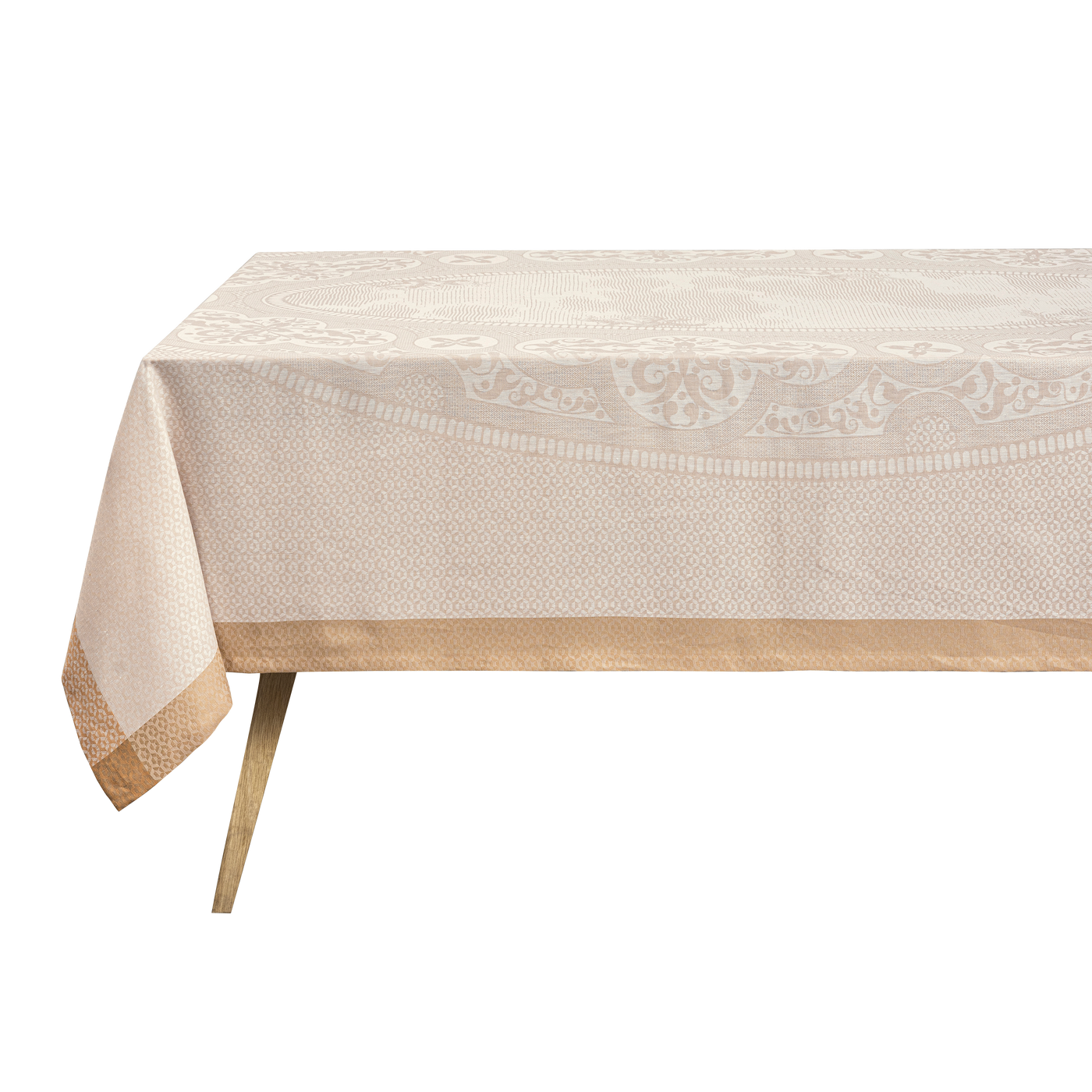 Le Jacquard Français Évasion Céleste tablecloth draped over table, ivory jacquard with gold border.