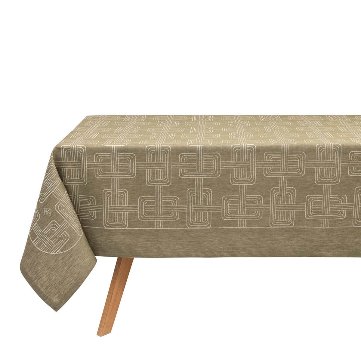 Le Jacquard Français Hôtel Particulier tablecloth in Green, draped over a table showing geometric jacquard pattern.