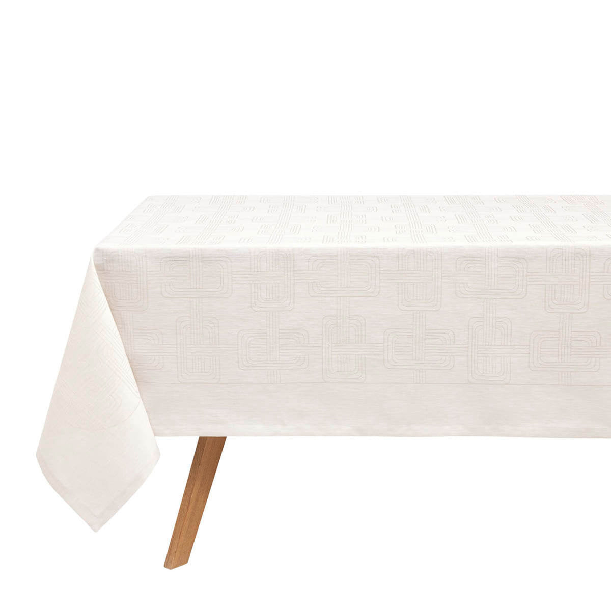 Le Jacquard Français Hôtel Particulier tablecloth in Gray, geometric jacquard pattern, draped on wood table.